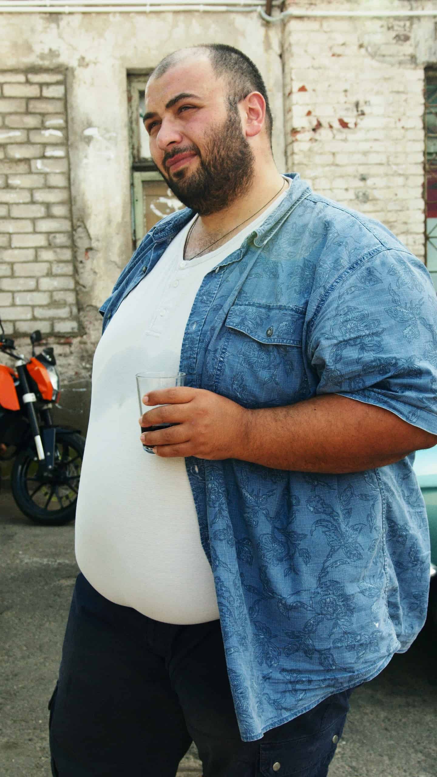 pexels-artem-podrez-4728882 obese man